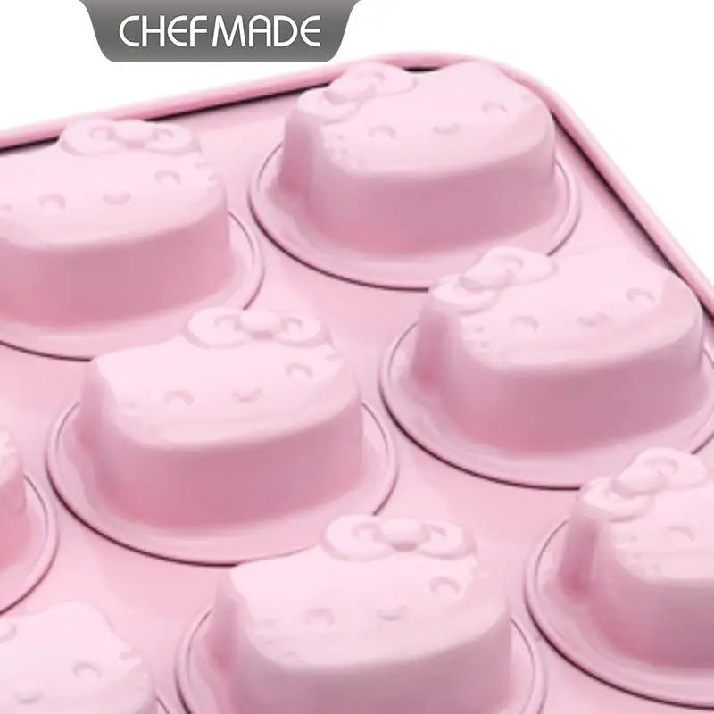 Pink silicone mold with cat-shaped cavities on a white background, branded 'CHEFMADE'.